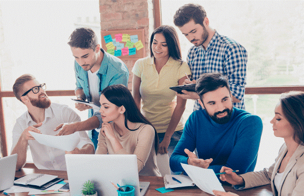 People discussing and communicating to drive growth.
